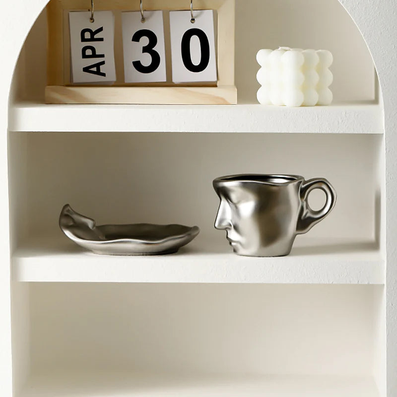 Creative Ceramic Face Coffee Mug With Artistic Metal Touch Design