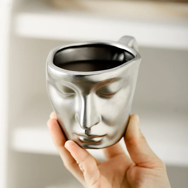 Creative Ceramic Face Coffee Mug With Artistic Metal Touch Design