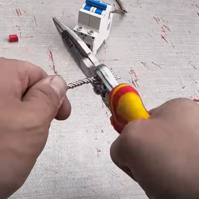 Versatile Wire Stripping Pliers With Built In Electricity Tester
